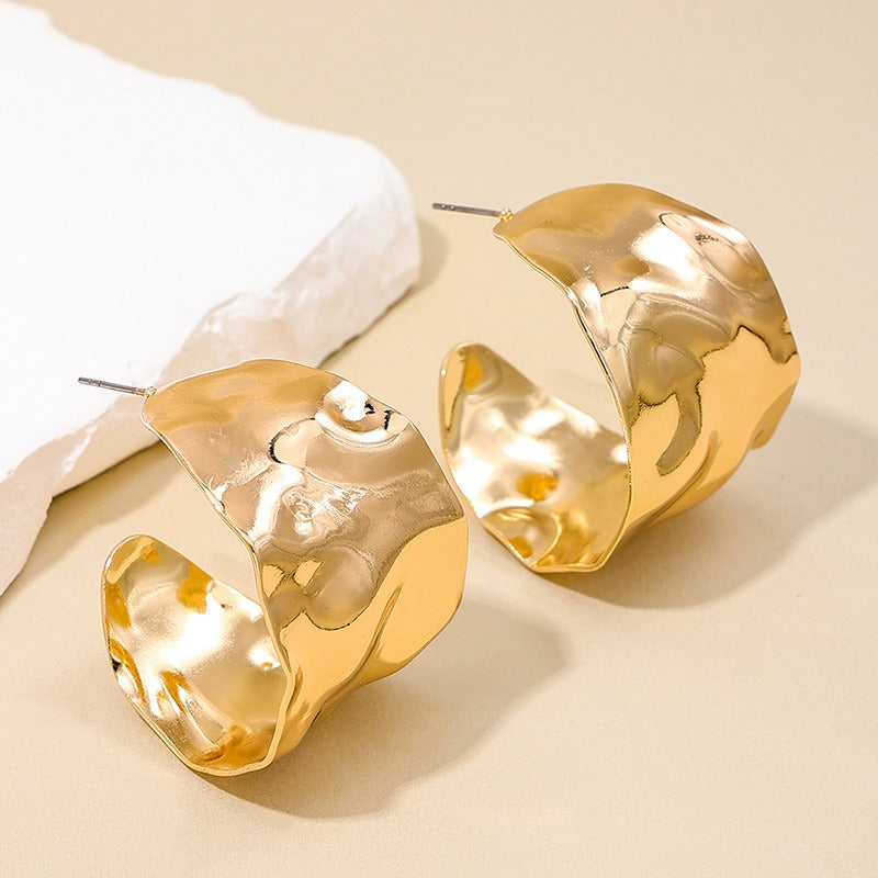 Wide face women's earrings with circular concave convex design