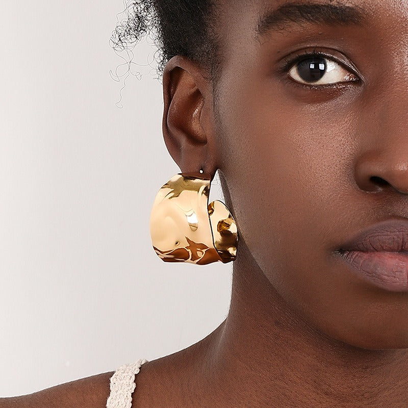 Wide face women's earrings with circular concave convex design