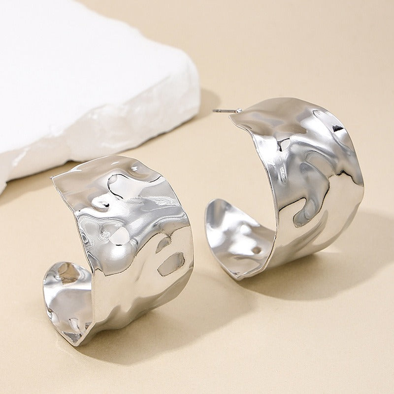 Wide face women's earrings with circular concave convex design