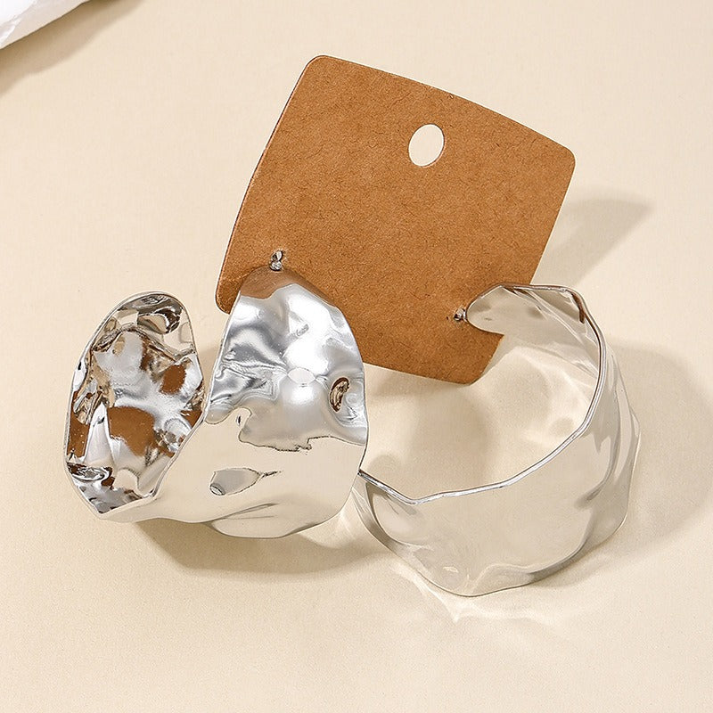 Wide face women's earrings with circular concave convex design